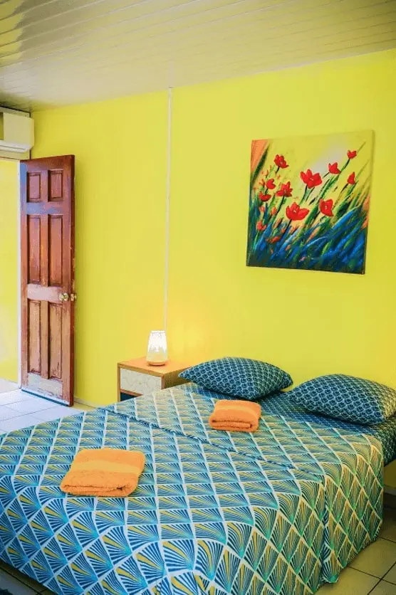 Chambre climatisée — Pension Ariitere, Huahine